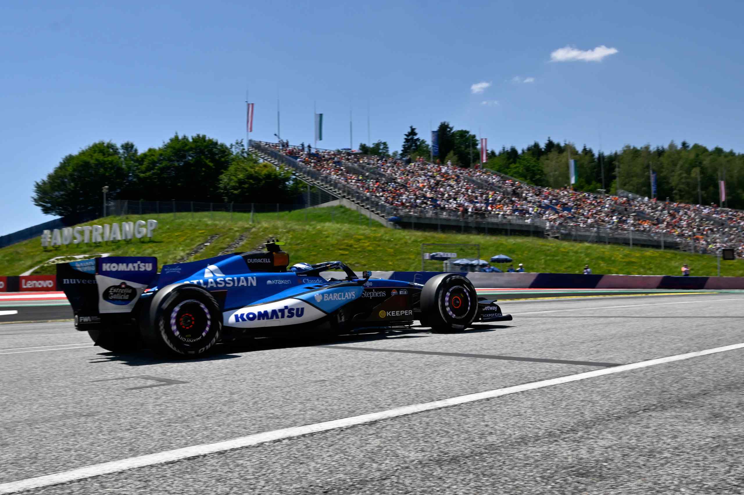 F1 race on a sunny day.